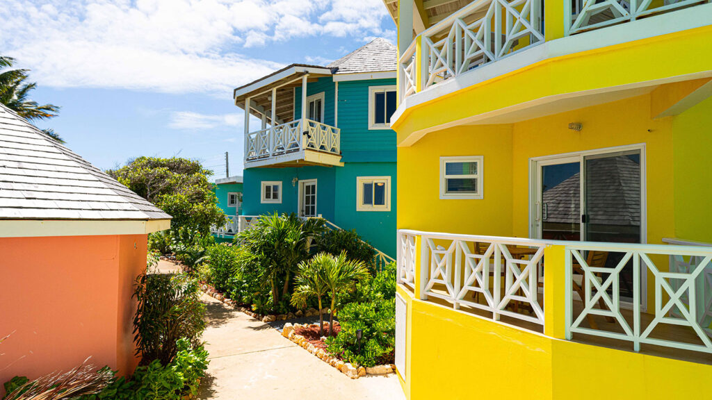 Arawak_suite-6-10_1600 Exterior view of Ocean Bliss Suite with colorful Caribbean architecture at Arawak Beach Club in Anguilla