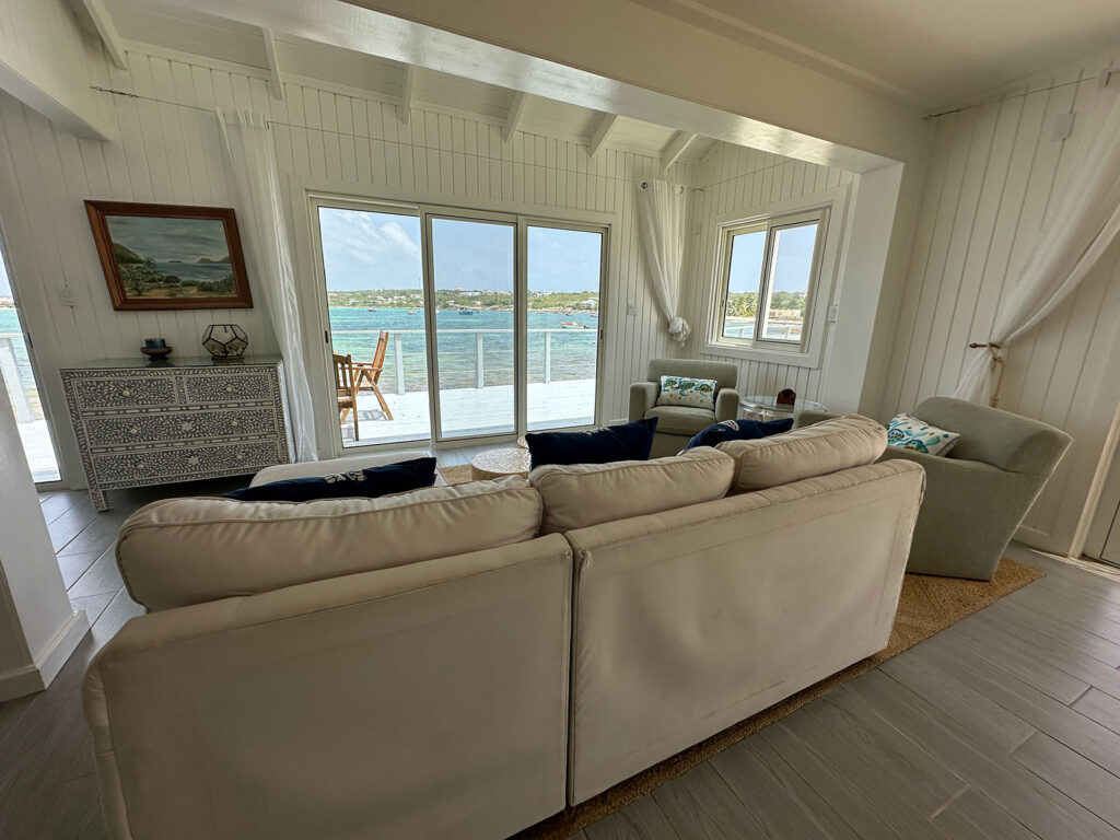 Arawak_villa-11_1600 Spacious living room at Arawak Villa with cozy seating and coastal decor