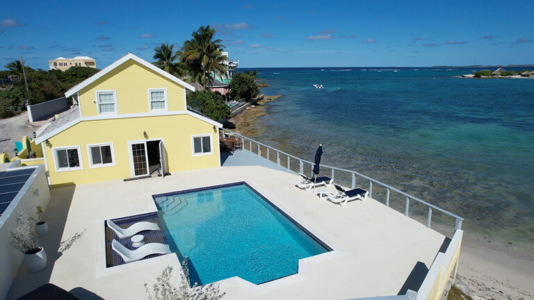 Oceanfront pool and patio at Arawak Villa, a private Anguilla villa rental